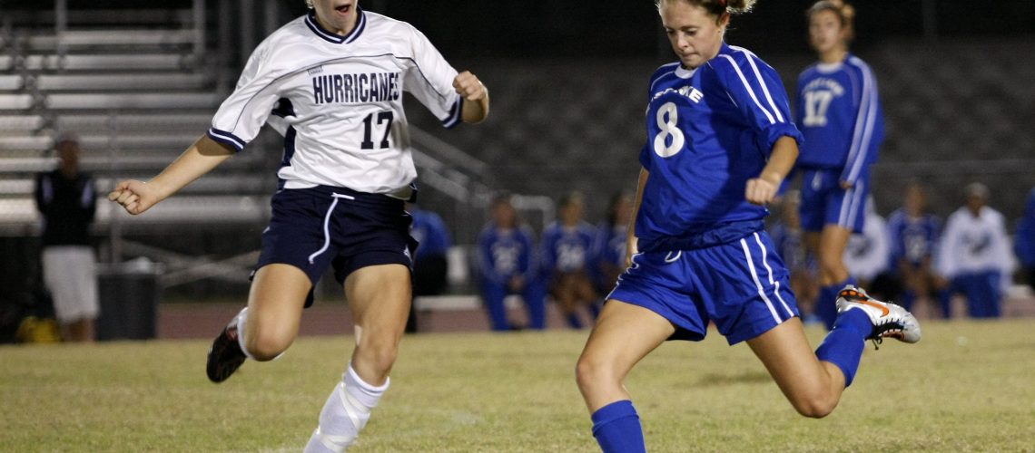 Palm Harbor University High's Kelly Phipps (17) and East Lake High's Meghan Dodge (8) battle for possession during the Hurricane Watch Soccer Tournament final on Friday, Dec. 17, 2010 at Palm Harbor University High School in Palm Harbor, FL. BRIAN BLANCO/Special to the Times